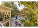 Inviting backyard pool area with mature landscaping, an outdoor deck, and lovely views at 608 W Beach Ct, Folly Beach, SC 29439