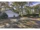 Detached two-car garage with ample parking space and a basketball hoop at 6094 Chisolm Rd, Johns Island, SC 29455