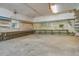 Garage interior with built-in shelving and work surfaces, perfect for organization at 6094 Chisolm Rd, Johns Island, SC 29455