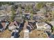 An aerial shot shows the neighborhood with mature trees surrounding well-maintained single-Gathering homes at 632 Grassy Hill Rd, Summerville, SC 29483