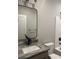 Bathroom vanity with granite top, black faucet, and white sink at 64 Piedmont Rd, Walterboro, SC 29488