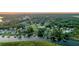 Aerial view of a lovely riverside community, featuring homes with private docks along a scenic waterway at 6917 Tanner Hall Blvd, Hanahan, SC 29410
