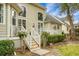 Backyard with a small porch with stairs and an outdoor swing at 6917 Tanner Hall Blvd, Hanahan, SC 29410