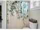 Bathroom featuring a toilet and a botanical design shower curtain at 6917 Tanner Hall Blvd, Hanahan, SC 29410