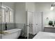 Bright bathroom showcasing a soaking tub, dual vanities, and stylish design elements at 6917 Tanner Hall Blvd, Hanahan, SC 29410