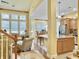 Open-concept living area combining the living room and kitchen with stainless appliances at 6934 Tanner Hall Blvd, Hanahan, SC 29410