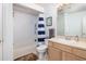 Small bathroom featuring a shower with tub, vanity, and bright lighting at 700 Daniel Ellis Dr # 8304, Charleston, SC 29412