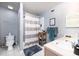 Cozy bathroom featuring a shower with tub, vanity, and gray colored walls at 700 Daniel Ellis Dr # 8304, Charleston, SC 29412