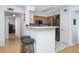 A well-lit kitchen with a breakfast bar, stainless steel appliances, and plenty of cabinet space at 700 Daniel Ellis Dr # 8304, Charleston, SC 29412
