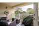 Relaxing patio area with comfortable seating and outdoor ceiling fan at 700 Daniel Ellis Dr # 8304, Charleston, SC 29412