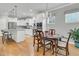 Kitchen featuring island with barstool seating, stainless appliances, granite counters, and eat in area at 714 Battery Edge Dr, Summerville, SC 29486