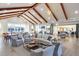 Community center lounge featuring vaulted ceilings with wood beams, luxury seating and lots of natural light at 714 Battery Edge Dr, Summerville, SC 29486