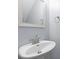 Stylish bathroom with a classic pedestal sink and modern fixtures at 7537 Parkers Ferry Rd, Adams Run, SC 29426