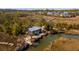 Quaint waterfront property featuring a dock for boats, surrounded by lush marshland at 775 Forrest Dr, Charleston, SC 29492