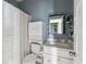 A charming full bathroom offers built-in storage and shower-tub combination at 775 Forrest Dr, Charleston, SC 29492