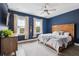 Comfortable bedroom with nice natural light featuring a wooden bedframe and adjacent dresser at 775 Forrest Dr, Charleston, SC 29492