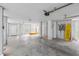 Spacious garage ready for parking, projects, and storage with bright lighting at 775 Forrest Dr, Charleston, SC 29492