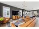 Open concept living room boasts lots of light and views of the kitchen at 775 Forrest Dr, Charleston, SC 29492