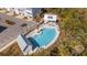Community pool with cabana, lounge chairs, and lush landscaping, perfect for relaxation at 775 Forrest Dr, Charleston, SC 29492
