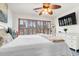 Inviting main bedroom with abundant light, with shutters and a view of the street at 783 Lake Frances Dr, Charleston, SC 29412