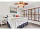 Inviting main bedroom featuring bright, natural light and window with wood shutters at 783 Lake Frances Dr, Charleston, SC 29412