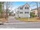 Charming two story home with white siding, black shutters, a well kept lawn, and mature trees at 783 Lake Frances Dr, Charleston, SC 29412