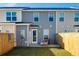 Backyard with a patio, neutral siding, water heater, AC unit, and a wooden fence at 826 Alma Square Dr, Moncks Corner, SC 29461