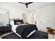 Stylish bedroom with a ceiling fan, comfortable bed, and modern decor at 916 Kincade Dr, Mount Pleasant, SC 29464