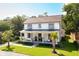 Inviting two-story home showcasing a cozy front porch, lush green lawn, and lovely landscaping at 916 Kincade Dr, Mount Pleasant, SC 29464