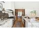 Spacious kitchen featuring stainless steel appliances and a marble-topped island with ample counter space at 916 Kincade Dr, Mount Pleasant, SC 29464