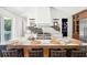 Stunning kitchen island with marble countertop, modern appliances and designer fixtures at 916 Kincade Dr, Mount Pleasant, SC 29464