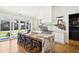 Kitchen island with seating and stainless steel appliances with outdoor views at 916 Kincade Dr, Mount Pleasant, SC 29464