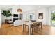 Inviting living room with hardwood floors, fireplace, and access to outdoor patio at 916 Kincade Dr, Mount Pleasant, SC 29464