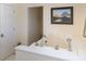 Close up of a jacuzzi-style bathtub and neutral walls at 10 Toms Turnaround Cir, Edisto Island, SC 29438