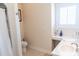 Bright bathroom with white vanity, sink, and shower with framed mirror, offering functionality at 10 Toms Turnaround Cir, Edisto Island, SC 29438