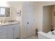 Bathroom with white cabinets, a granite countertop and tiled floors at 10 Toms Turnaround Cir, Edisto Island, SC 29438