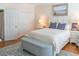 Serene bedroom with a comfortable bed, stylish decor, and access to an ensuite bathroom at 10 Toms Turnaround Cir, Edisto Island, SC 29438