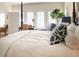 Inviting bedroom with a comfortable bed, stylish pillows, and a tranquil ambiance at 10 Toms Turnaround Cir, Edisto Island, SC 29438