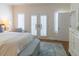 Bright bedroom with French doors, offering ample light and easy access to the outdoors at 10 Toms Turnaround Cir, Edisto Island, SC 29438