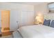 Comfortable bedroom with ensuite bath, closet and seaside themed art at 10 Toms Turnaround Cir, Edisto Island, SC 29438