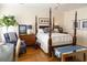 Stylishly decorated bedroom featuring a four-poster bed and matching decor at 10 Toms Turnaround Cir, Edisto Island, SC 29438