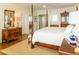 Bright bedroom features hardwood floors and natural light at 10 Toms Turnaround Cir, Edisto Island, SC 29438