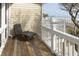 Seaside deck with stylish chairs to admire the beautiful ocean and tropical palm trees at 10 Toms Turnaround Cir, Edisto Island, SC 29438