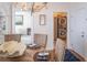 An airy dining space showcases a stylish table, comfortable seating, and a glimpse into the laundry area at 10 Toms Turnaround Cir, Edisto Island, SC 29438