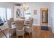 Charming dining room featuring a rustic table, comfortable seating, and natural light from nearby windows at 10 Toms Turnaround Cir, Edisto Island, SC 29438