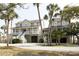 Charming two-story coastal home featuring a spacious porch and beautiful architectural details at 10 Toms Turnaround Cir, Edisto Island, SC 29438