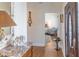 Elegant foyer with a console table, decorative mirror, and hardwood floors at 10 Toms Turnaround Cir, Edisto Island, SC 29438