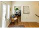 Hallway with access to a study and lots of natural light at 10 Toms Turnaround Cir, Edisto Island, SC 29438