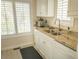 Kitchen sink with stainless steel appliances and granite countertops at 10 Toms Turnaround Cir, Edisto Island, SC 29438