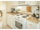 Charming kitchen featuring granite countertops and stainless steel appliances at 10 Toms Turnaround Cir, Edisto Island, SC 29438
